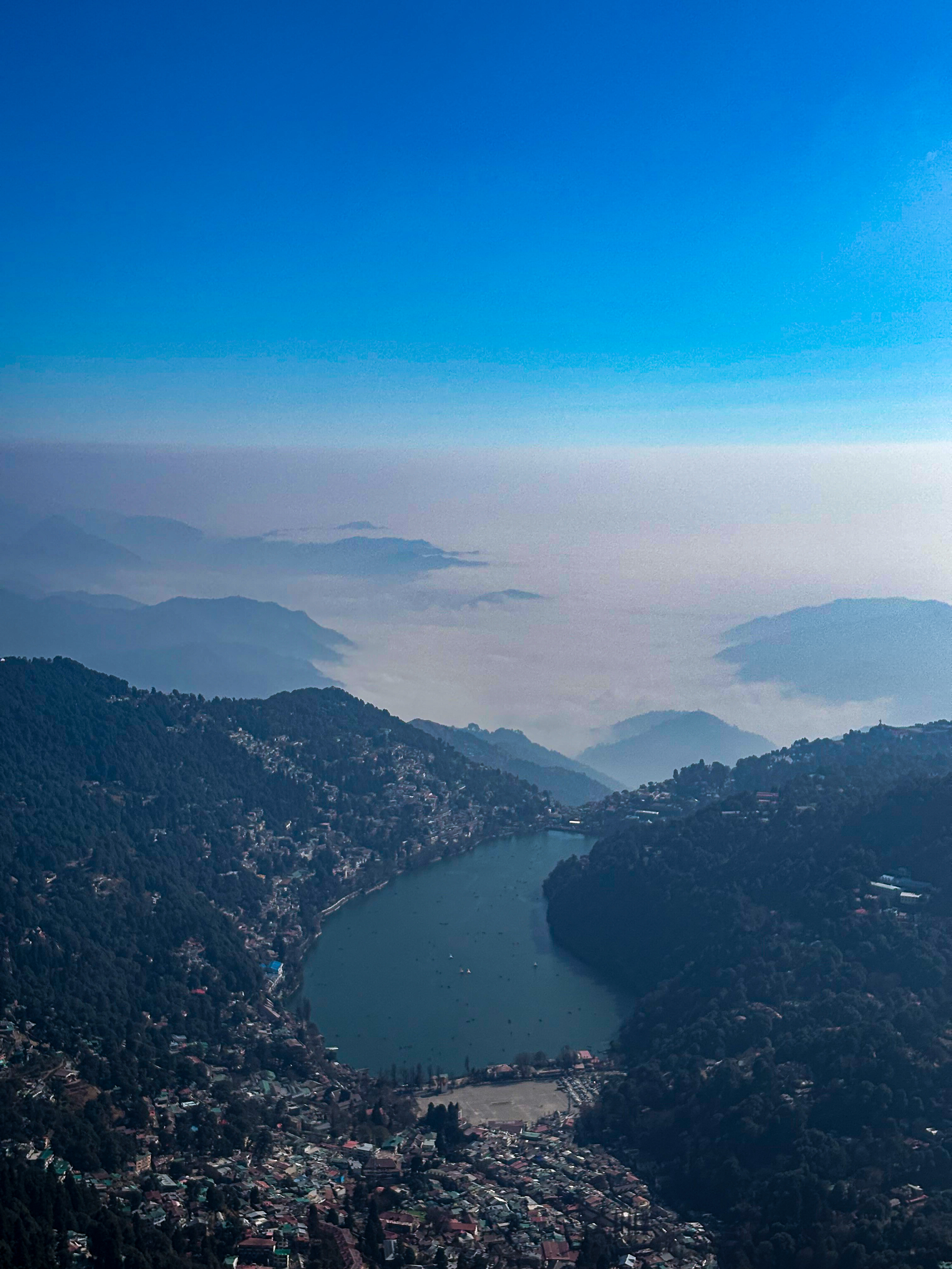 A View Worth the Climb  A scenic reward after the 2-hour trek to Naina Peak with Nainital town and Naini Lake in sight.